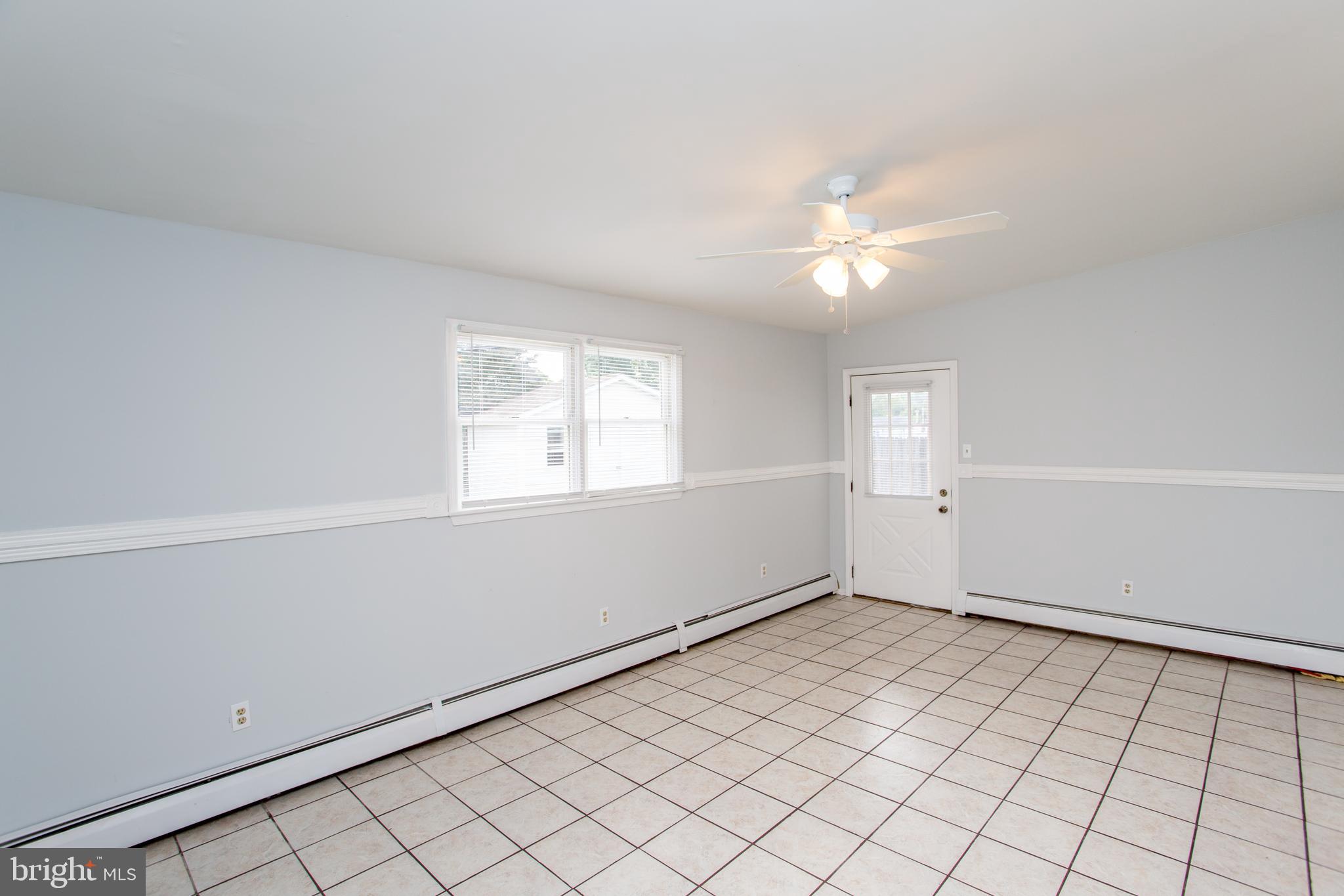 23 Misty Pine Road Levittown, PA 19056 - Photo 23 of 74 a view of an empty room and window