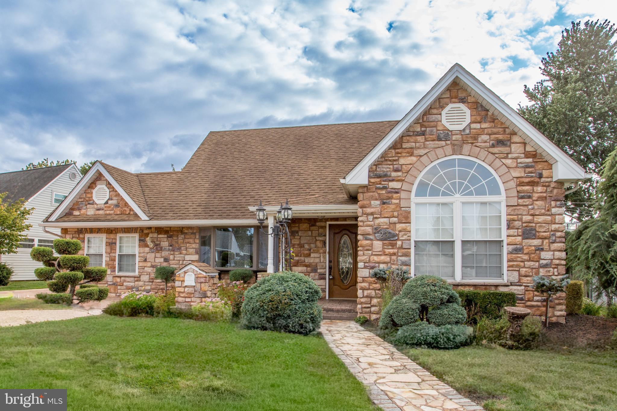 23 Misty Pine Road Levittown, PA 19056 - Photo 4 of 74 a front view of a house with a yard