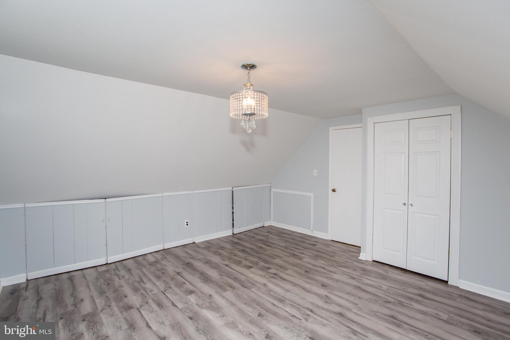 23 Misty Pine Road Levittown, PA 19056 - Photo 42 of 74 a view of a room with wooden floor and ceiling fan
