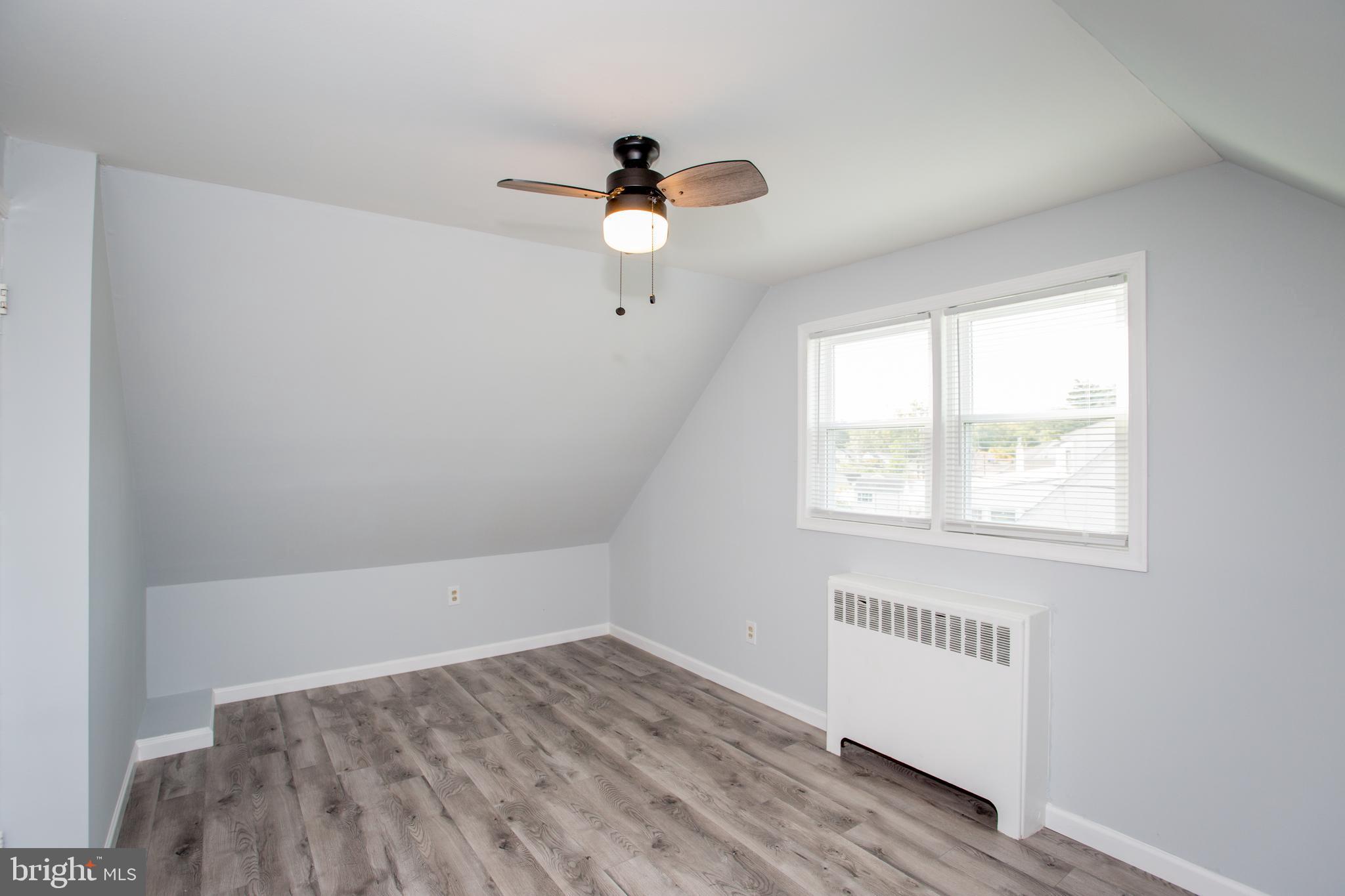23 Misty Pine Road Levittown, PA 19056 - Photo 45 of 74 a view of an empty room with a window