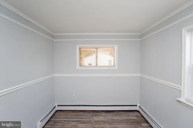 an aerial view of residential building with parking space