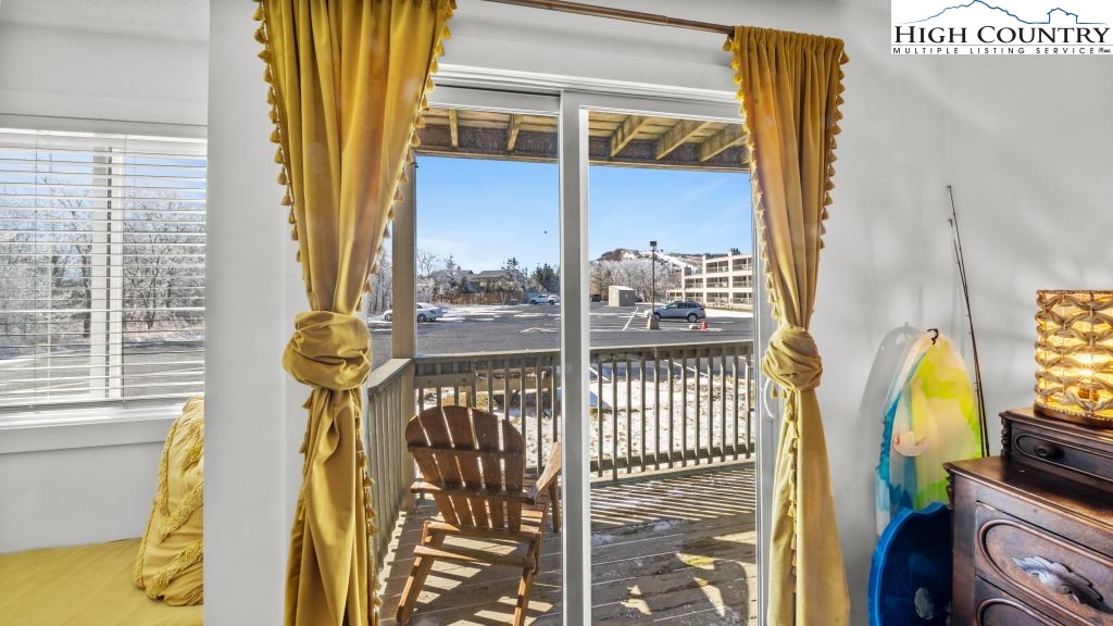 301 Pinnacle Inn Road, Unit 1114 Beech Mountain, NC 28604 - Photo 7 of 16 a view of a balcony with furniture
