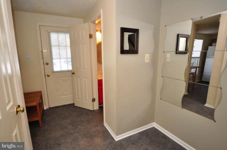 1491 Autumn Ridge Circle Reston, VA 20194 - Photo 7 of 20 a view of hallway with front door