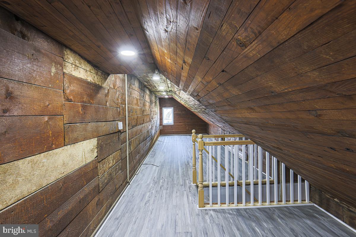 604 East 31st Street Baltimore, MD 21218 - Photo 50 of 50 a view of balcony with wooden floor