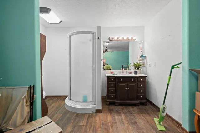 a bathroom with a sink and a mirror