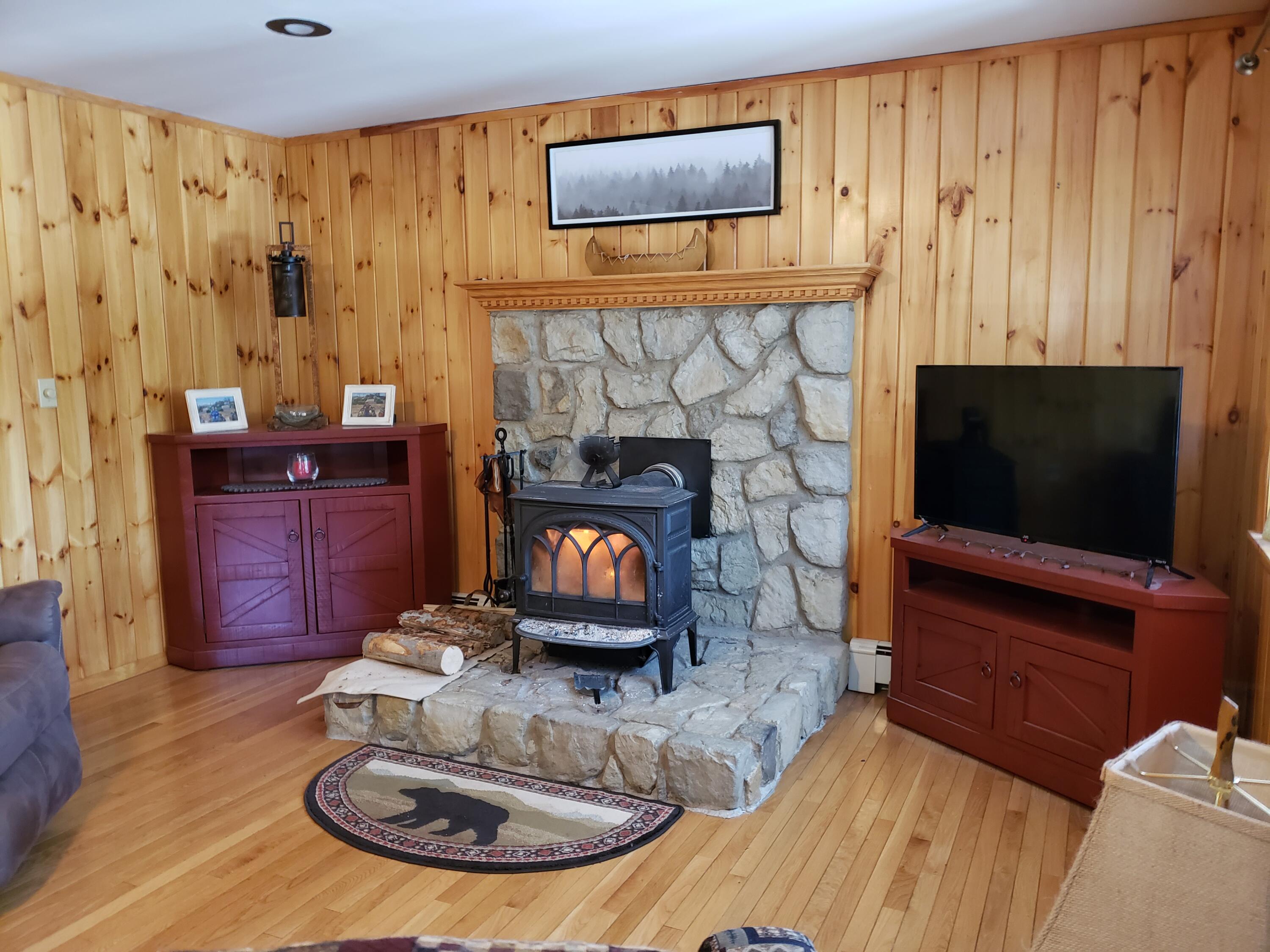 18 Deer Run Road Greenville, ME 04441 - Photo 31 of 66 Living Room - Wood Stove
