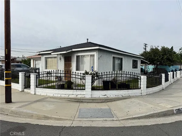 front view of a house with a small yard