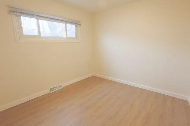 a view of a hallway with staircase
