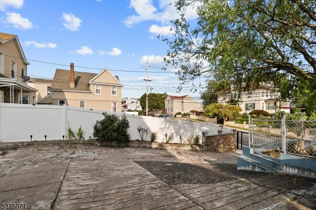 a view of a street with cars