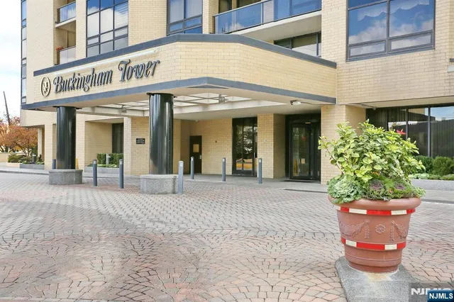 a view of a hallway with a bathroom