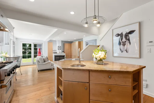 a view of living room with furniture and chandelier