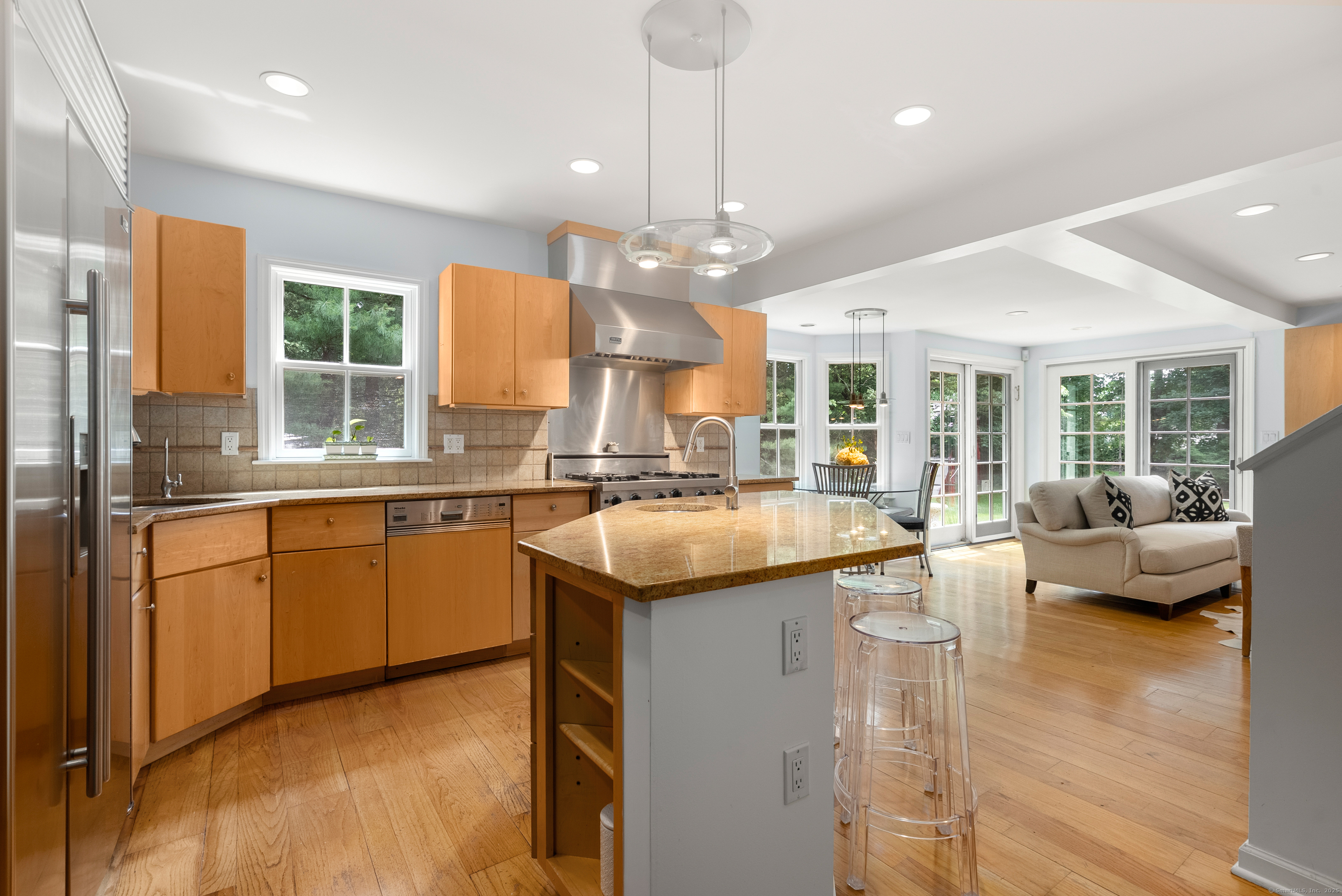 18 Bridge Street Westport, CT 06880 - Photo 19 of 36 a kitchen with a sink stove and a refrigerator