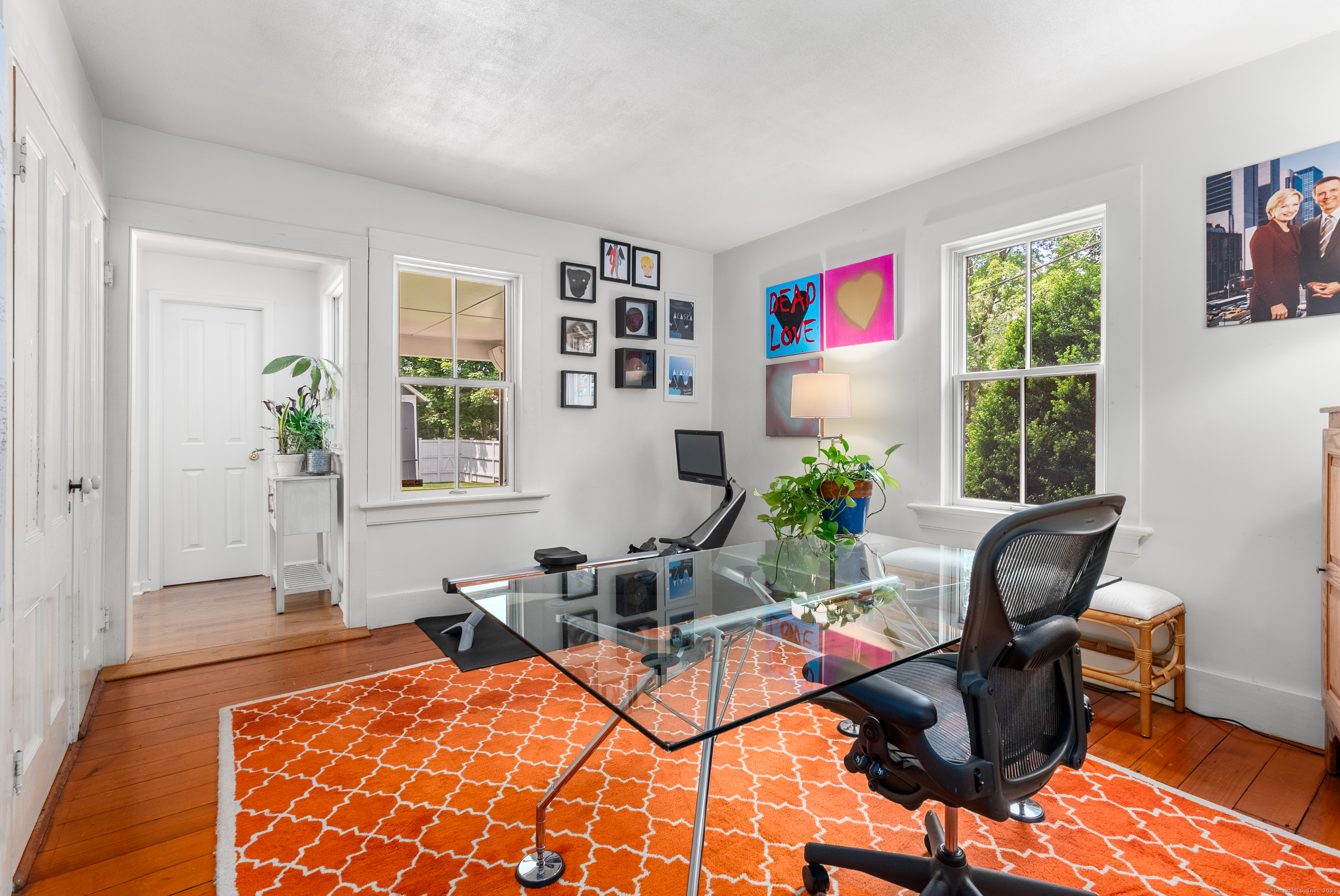 18 Bridge Street Westport, CT 06880 - Photo 25 of 36 a living room with furniture a window and a potted plant