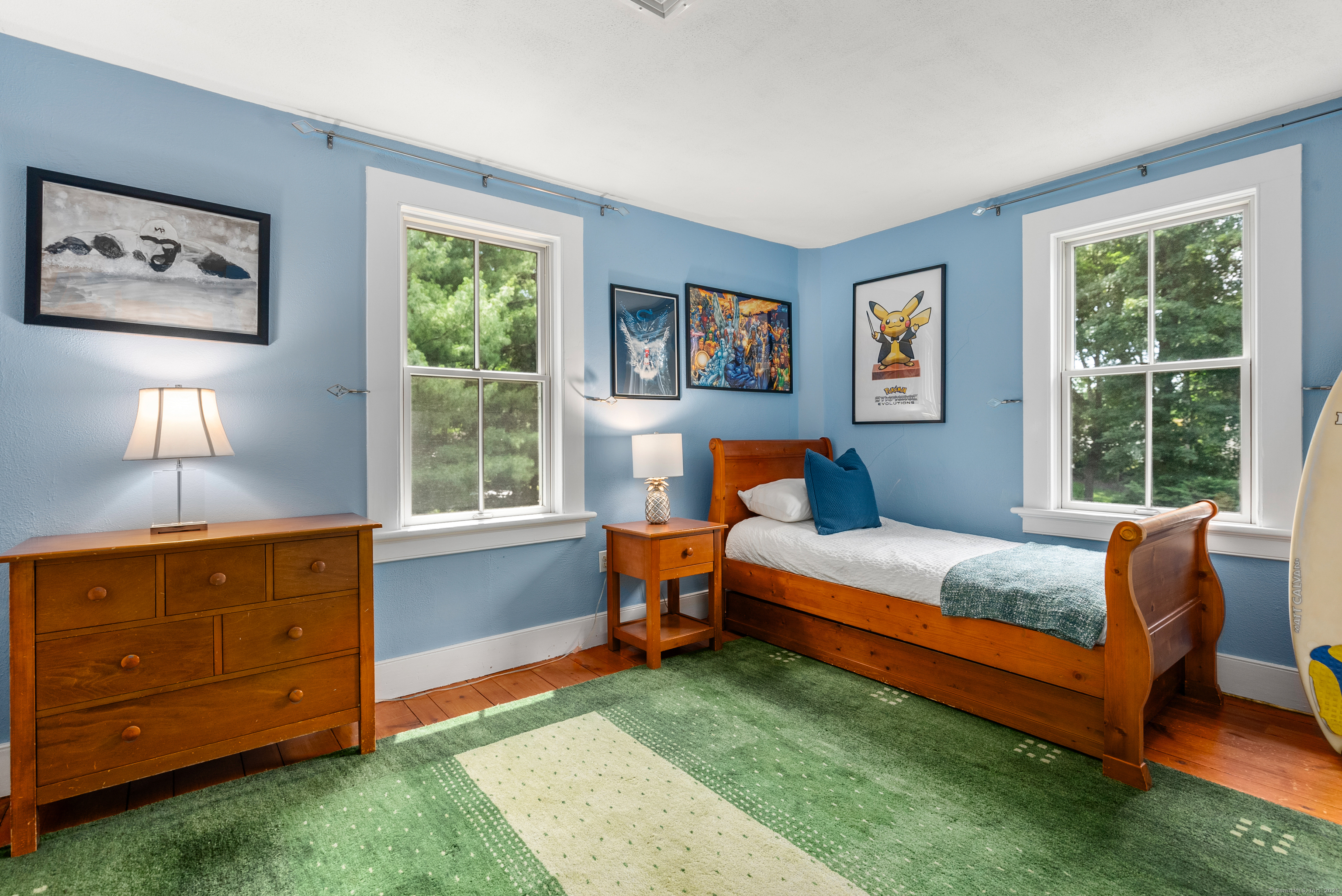 18 Bridge Street Westport, CT 06880 - Photo 28 of 36 a bedroom with a bed and a dresser next to a window