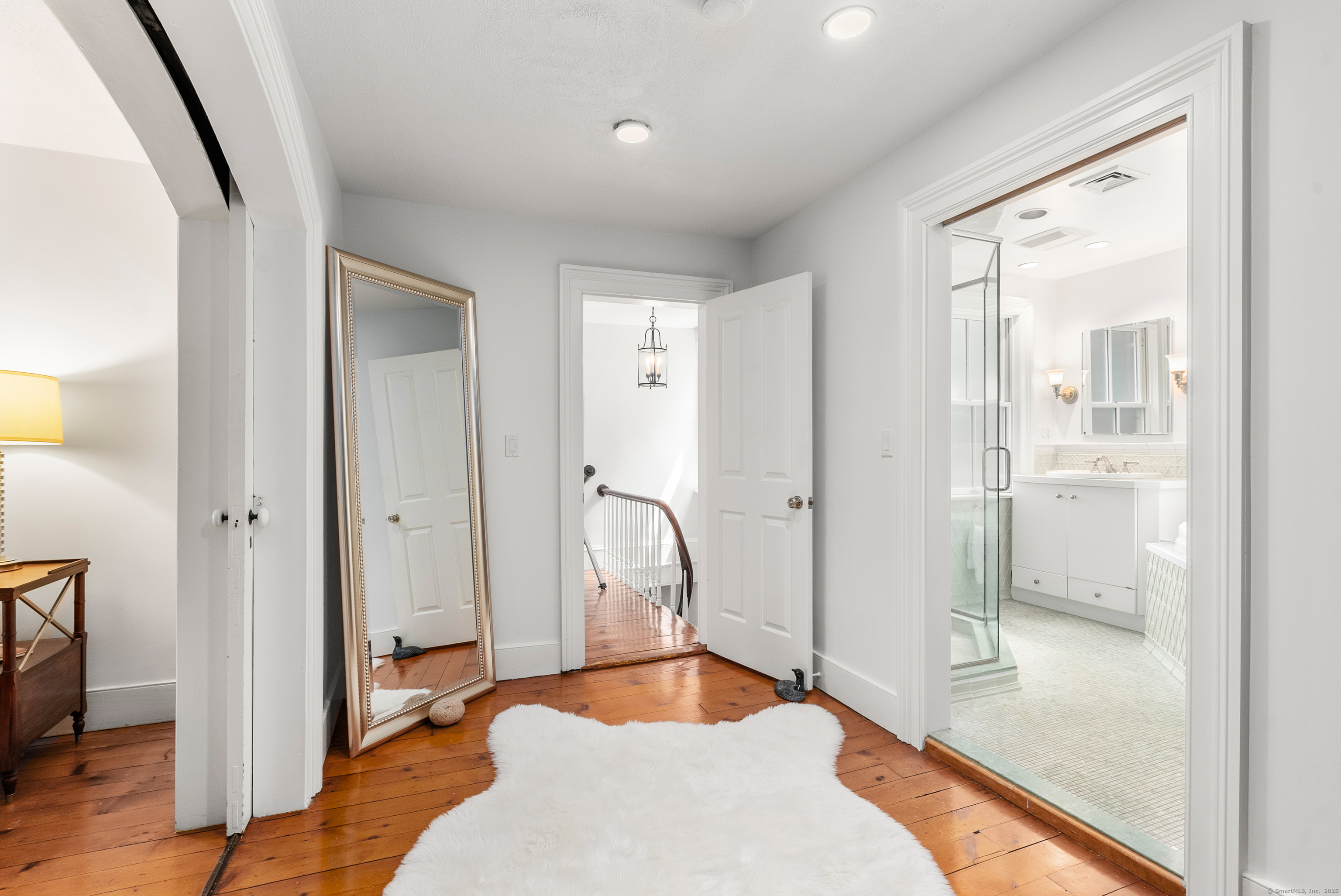 18 Bridge Street Westport, CT 06880 - Photo 32 of 36 a bathroom with a tub and shower