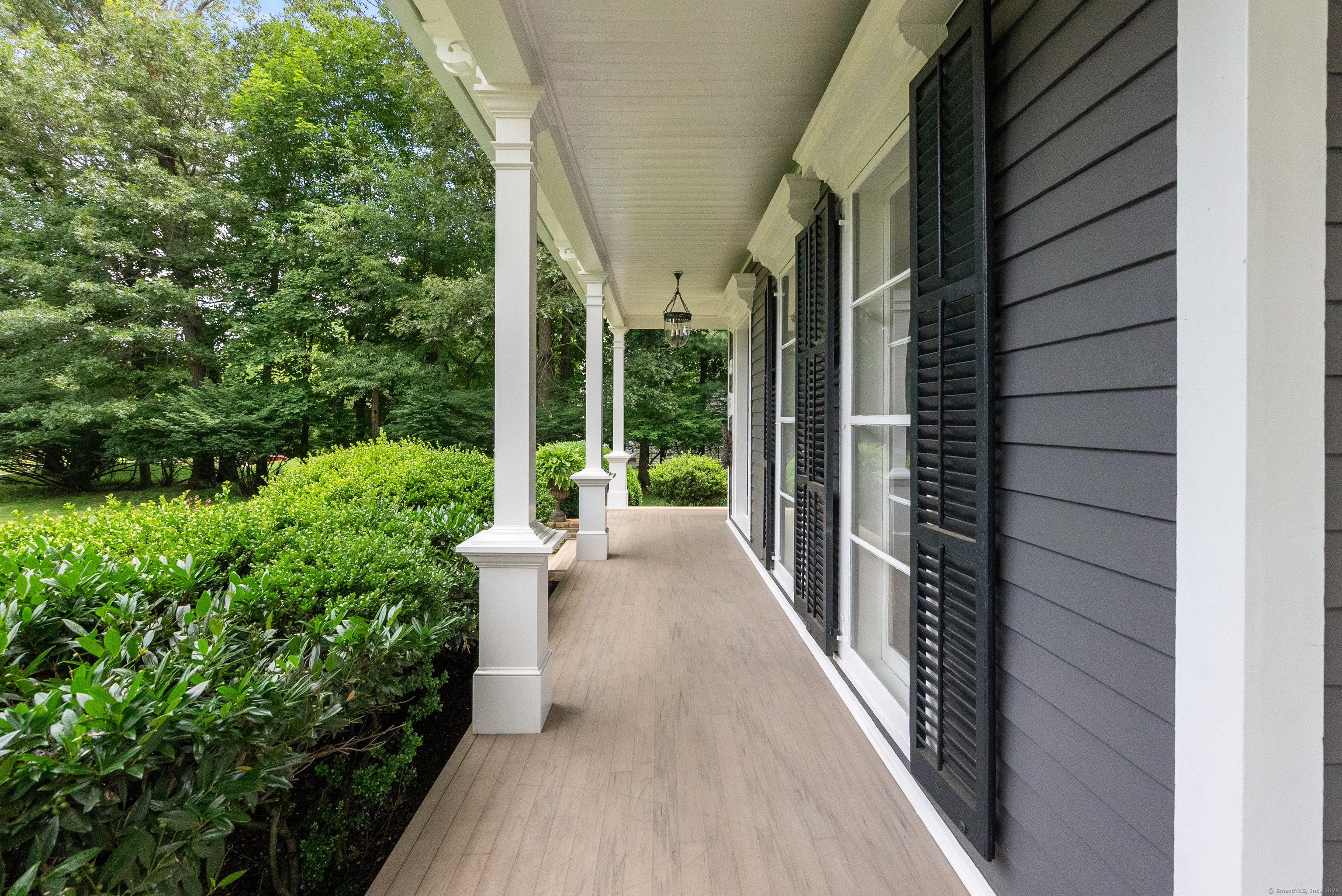 18 Bridge Street Westport, CT 06880 - Photo 4 of 36 a view of a pathway with a balcony