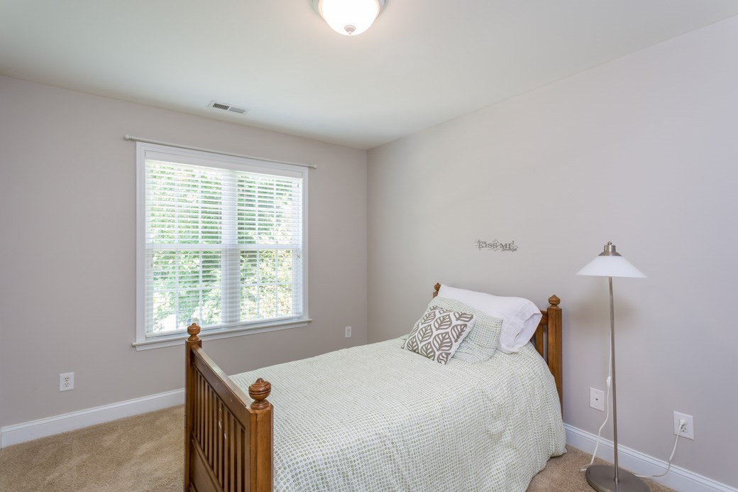 7604 Rambeau Circle Raleigh, NC 27613 - Photo 18 of 25 Calming paint colors in the bedrooms equal a great night's sleep! Bedroom