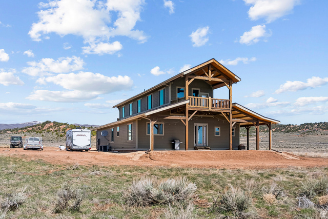 46997 West Thunder Road Fruitland, UT 84027 - Photo 40 of 49 Back of house with a patio and a deck with mountain view