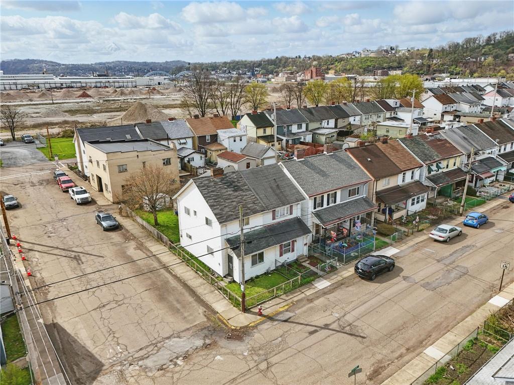 43 Orchard Street McKees Rocks, PA 15136 - Photo 2 of 18 an aerial view of a house with a garden