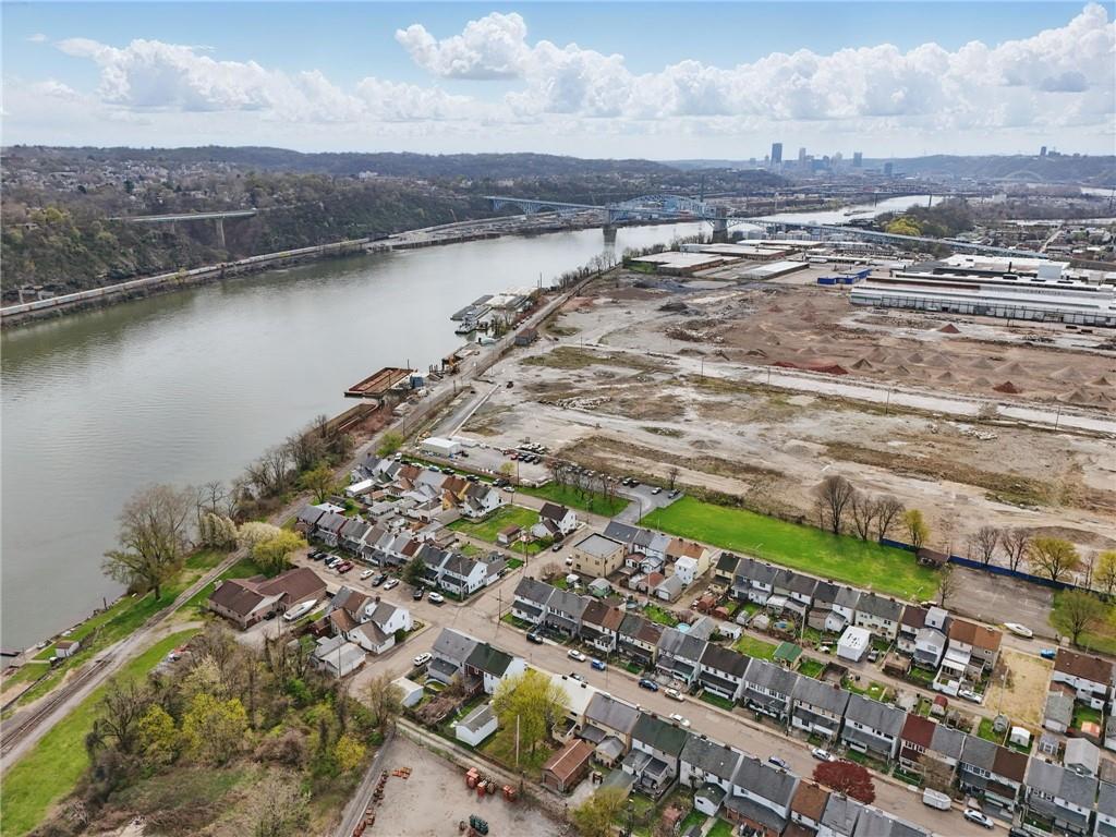 43 Orchard Street McKees Rocks, PA 15136 - Photo 3 of 18 a view of a lake with a mountain