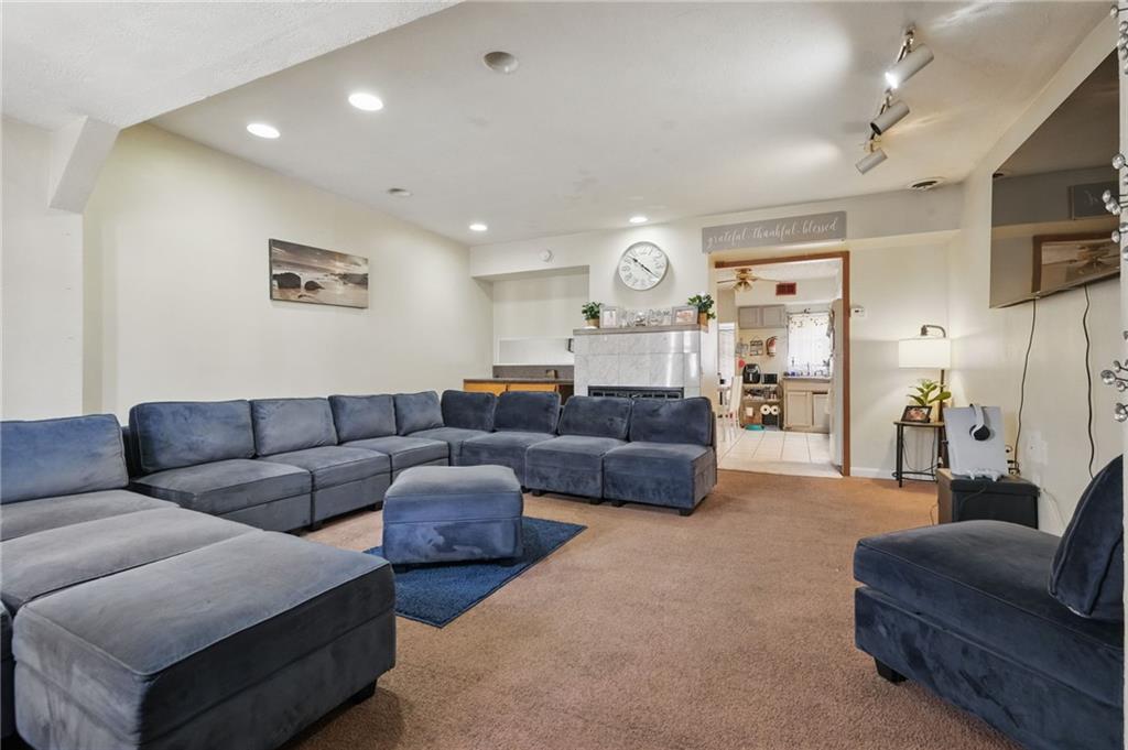 43 Orchard Street McKees Rocks, PA 15136 - Photo 5 of 18 a living room with furniture and a large window