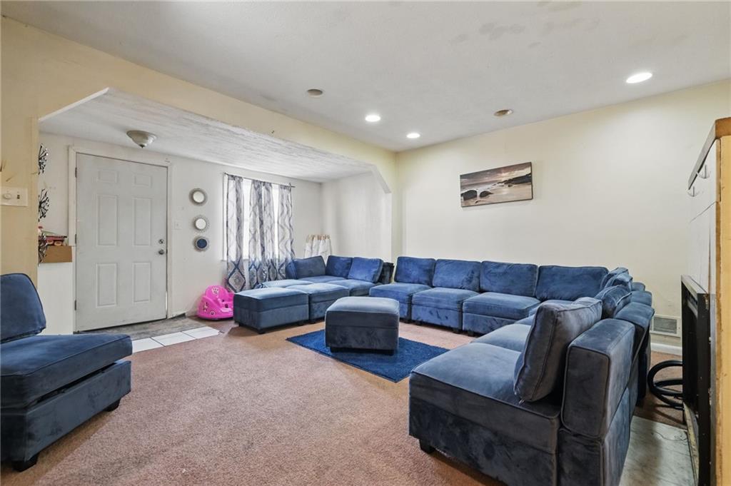 43 Orchard Street McKees Rocks, PA 15136 - Photo 6 of 18 a living room with furniture and a couch