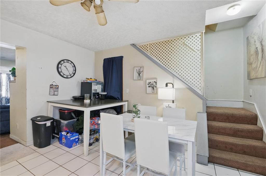43 Orchard Street McKees Rocks, PA 15136 - Photo 9 of 18 a view of kitchen with furniture and a clock