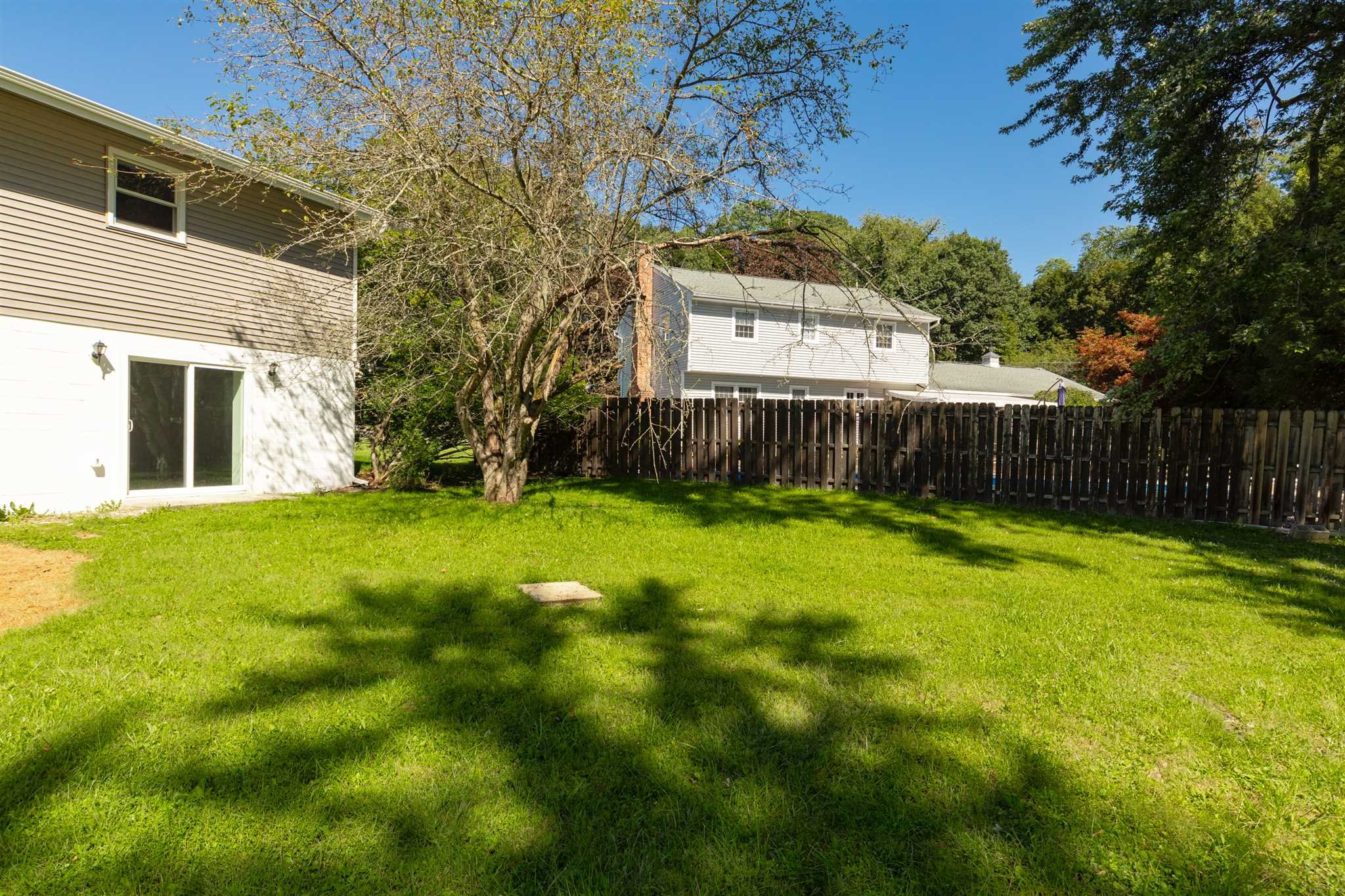 9 Manor Way Poughkeepsie, NY 12603 - Photo 20 of 23 a view of a house with a backyard