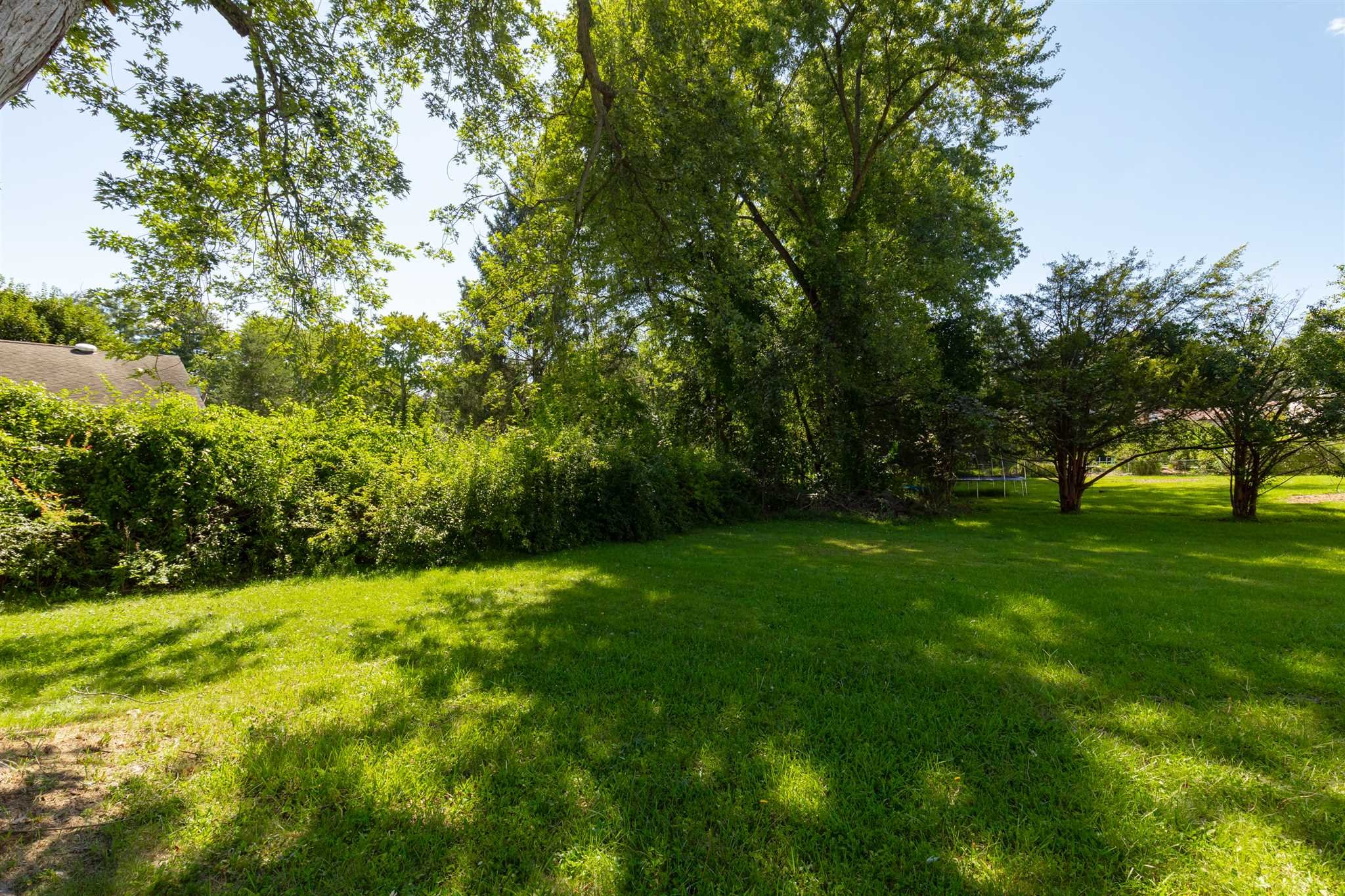9 Manor Way Poughkeepsie, NY 12603 - Photo 22 of 23 a view of an trees with a yard