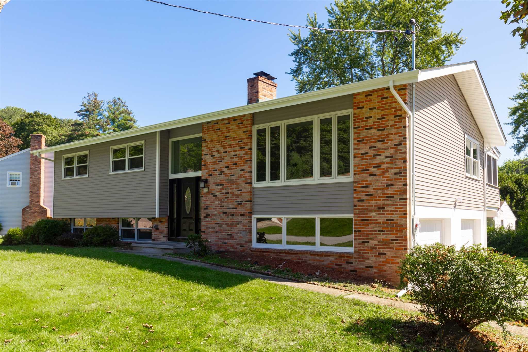 9 Manor Way Poughkeepsie, NY 12603 - Photo 23 of 23 a front view of a house with a yard