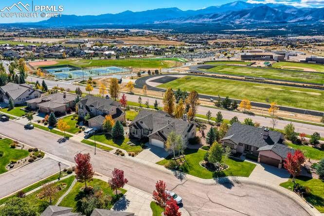 13968 Windy Oaks Road Colorado Springs, CO 80921 - Photo 3 of 34 an aerial view of residential houses and outdoor space