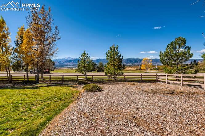 13968 Windy Oaks Road Colorado Springs, CO 80921 - Photo 33 of 34 a view of a yard with swimming pool