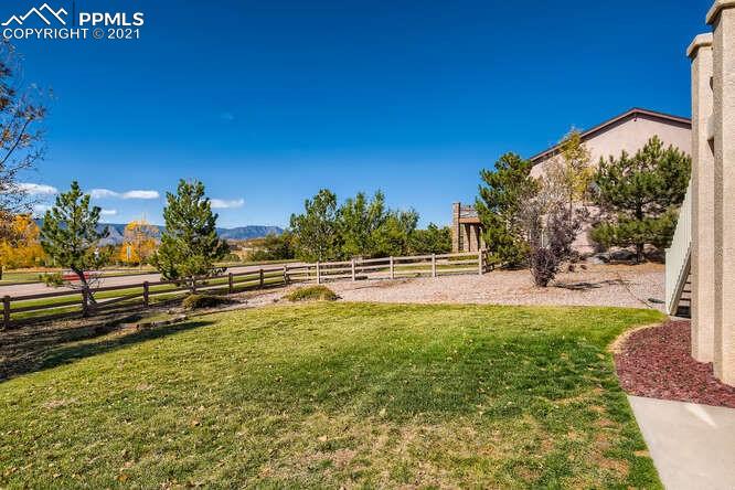 13968 Windy Oaks Road Colorado Springs, CO 80921 - Photo 34 of 34 a view of a yard with an outdoor space