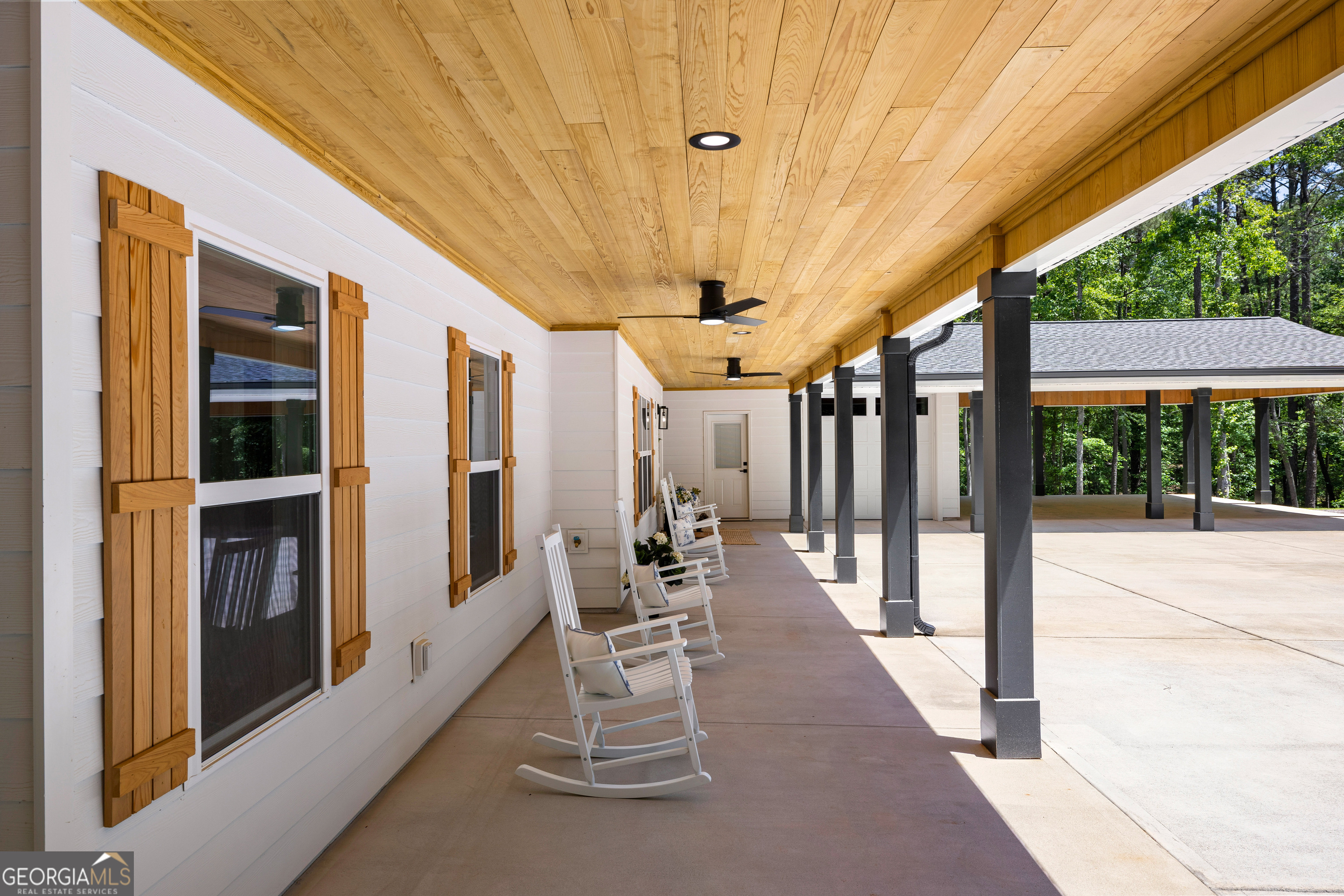 354 Turner Road Newnan, GA 30263 - Photo 6 of 79 a view of a patio with table and chairs