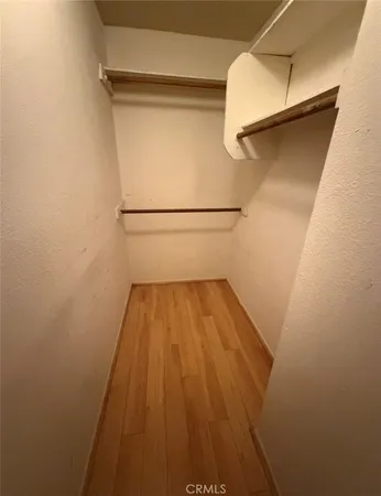 a bathroom with a wooden floor