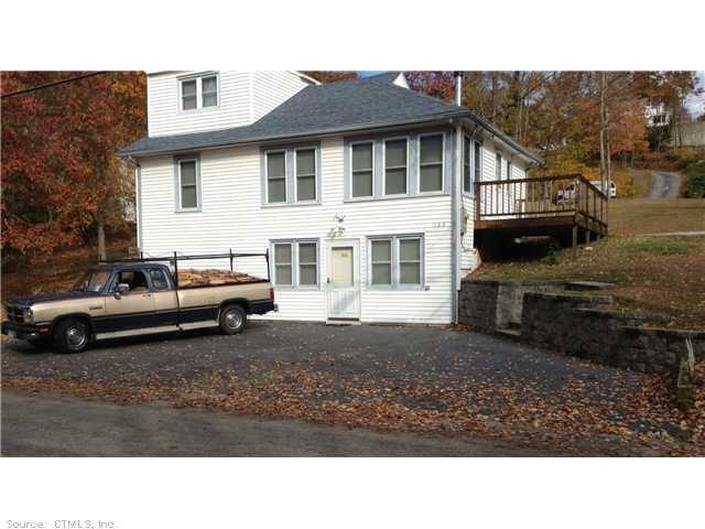 166 Giants Neck Road East Lyme, CT 06357 - Photo 1 of 1 a black and white photo of a house