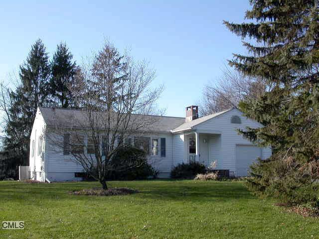 14 Pondfield Road New Fairfield, CT 06812 - Photo 1 of 1 a front view of a house with a garden