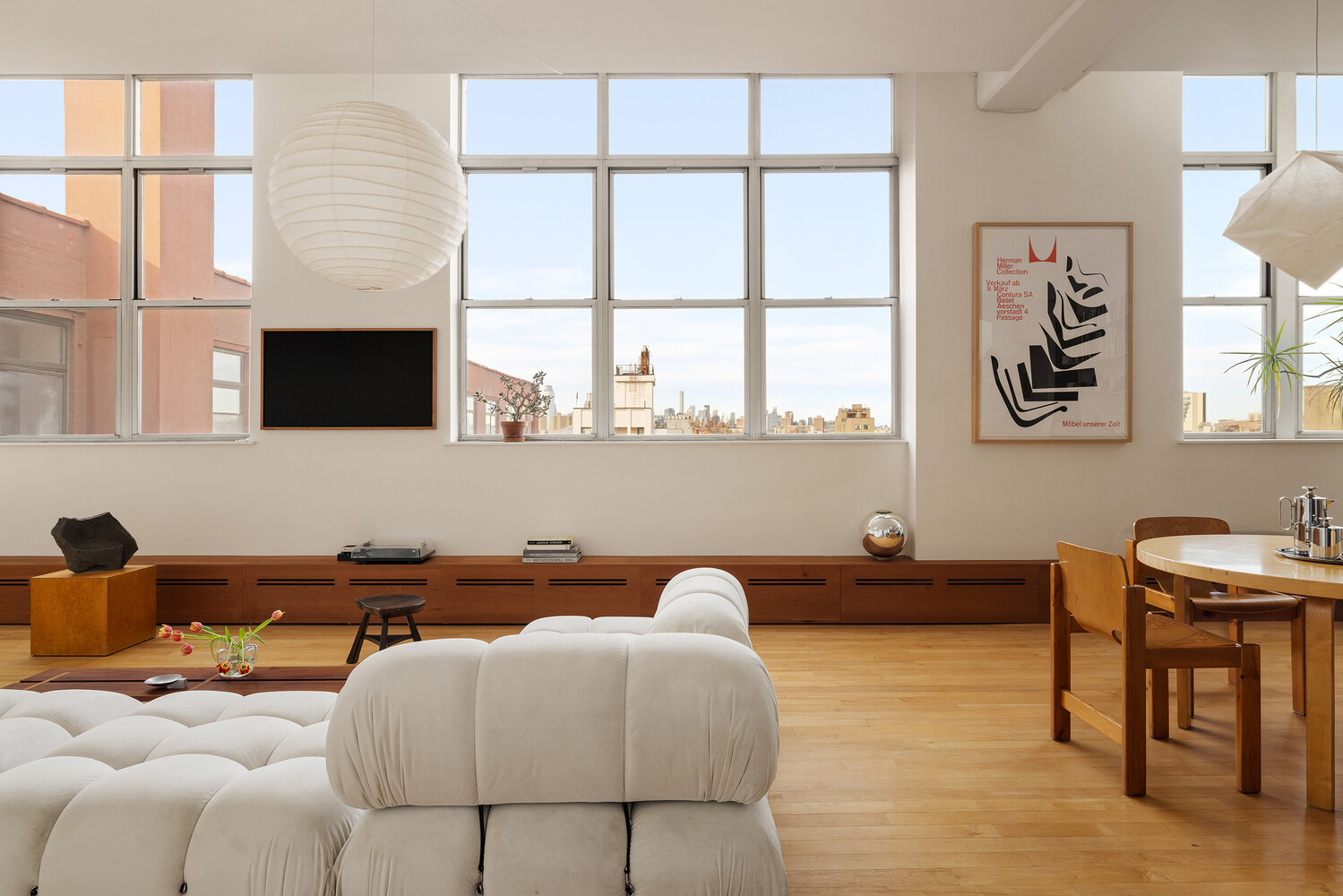 970 Kent Avenue, Unit 512 Brooklyn, NY 11205 - Photo 4 of 14 a bedroom with furniture and a window