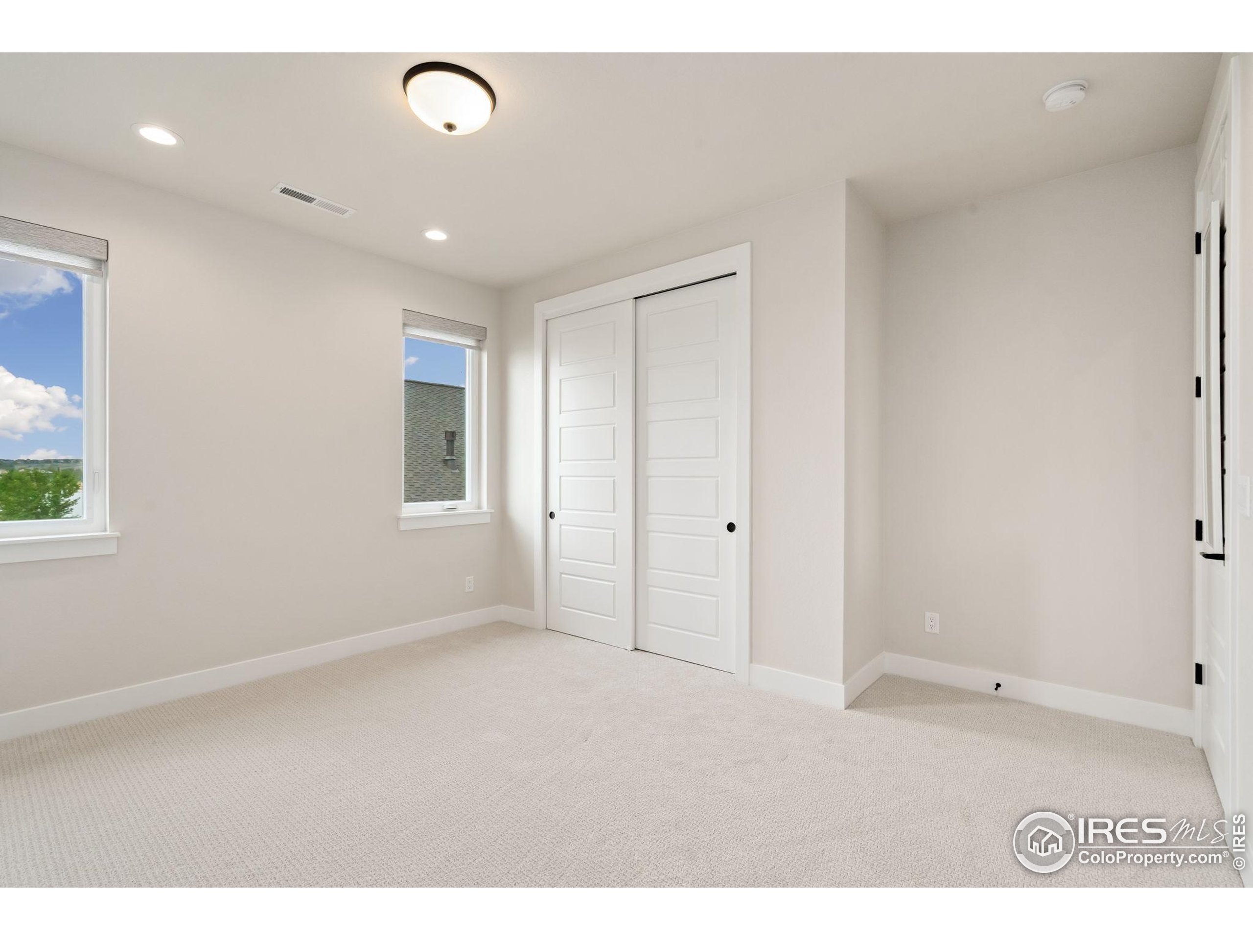 1729 Beachside Drive Windsor, CO 80550 - Photo 38 of 49 a view of an empty room