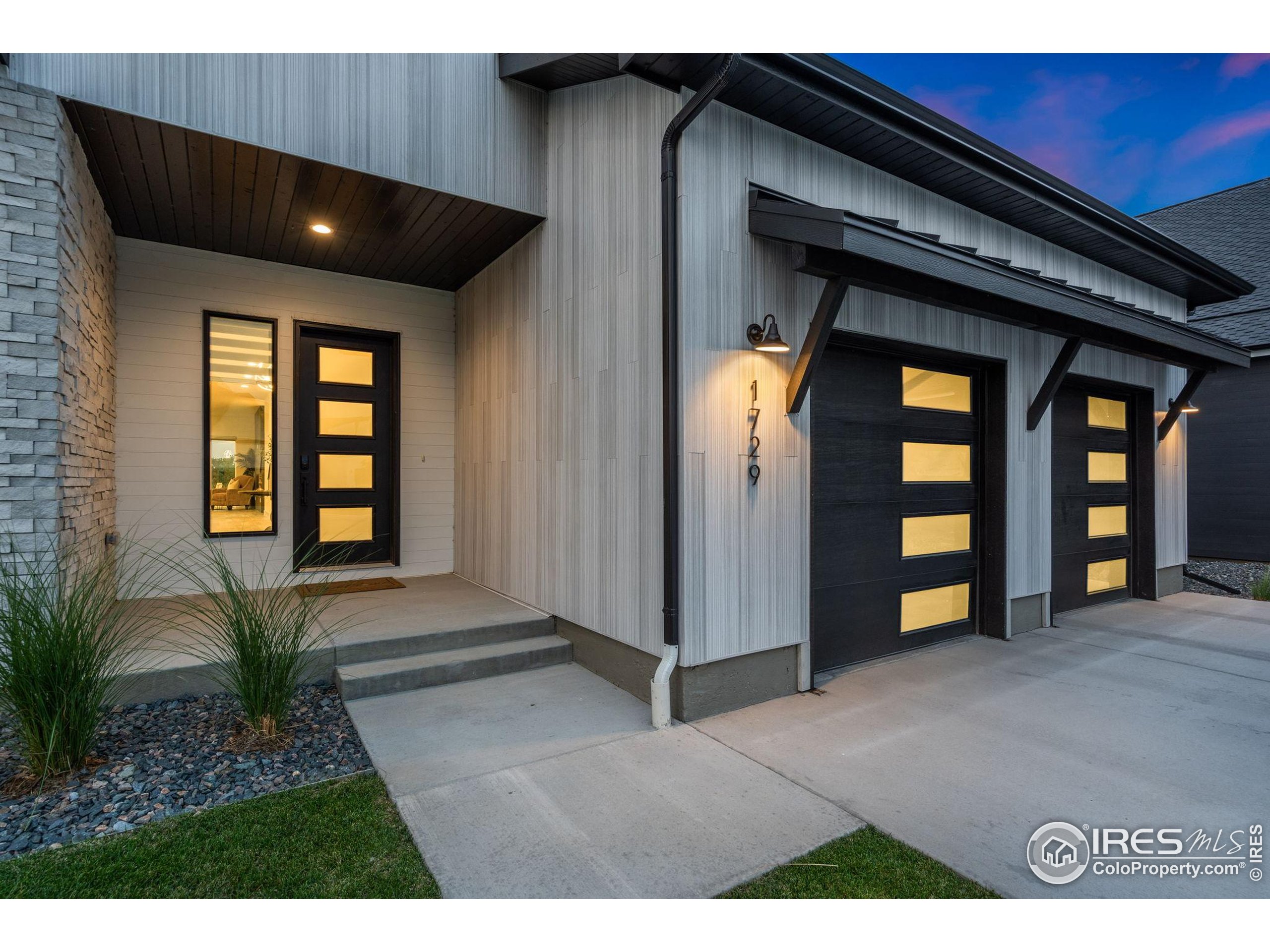 1729 Beachside Drive Windsor, CO 80550 - Photo 4 of 49 a view of an entryway of the house