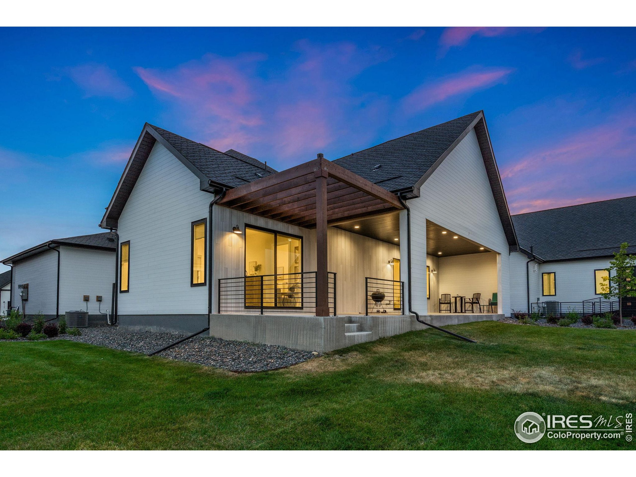 1729 Beachside Drive Windsor, CO 80550 - Photo 41 of 49 a view of backyard of house with green space