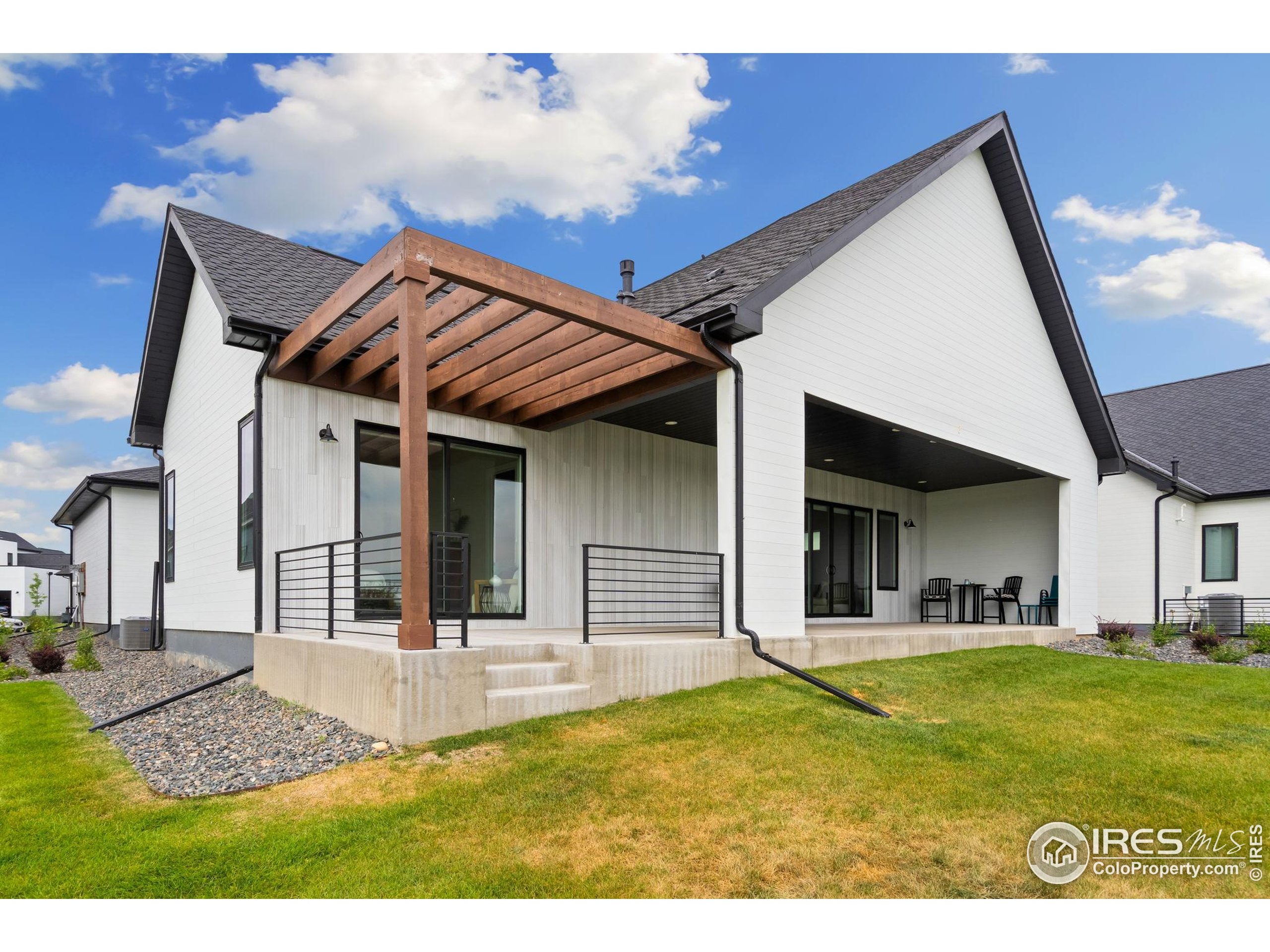 1729 Beachside Drive Windsor, CO 80550 - Photo 43 of 49 a view of an house with backyard space and balcony