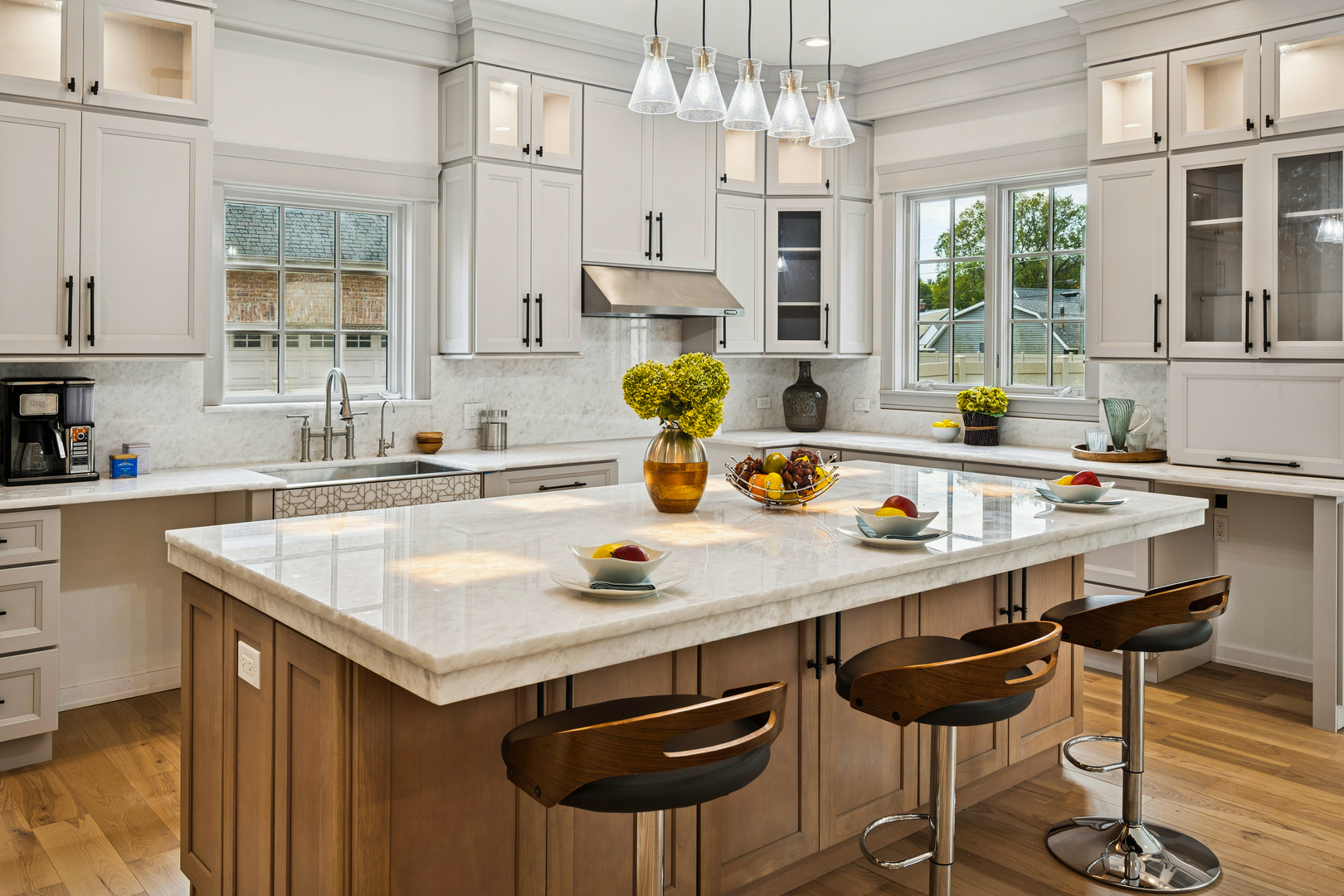1921 Beechnut Road Northbrook, IL 60062 - Photo 17 of 56 a kitchen with a sink a stove and chairs