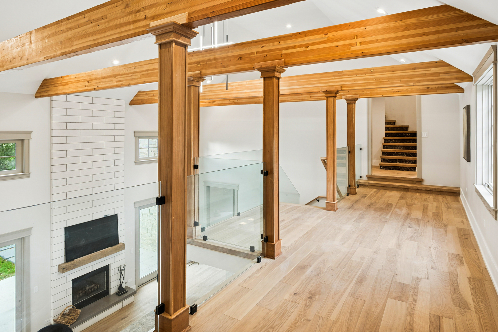 1921 Beechnut Road Northbrook, IL 60062 - Photo 27 of 56 a view of a livingroom with wooden floor and a fireplace