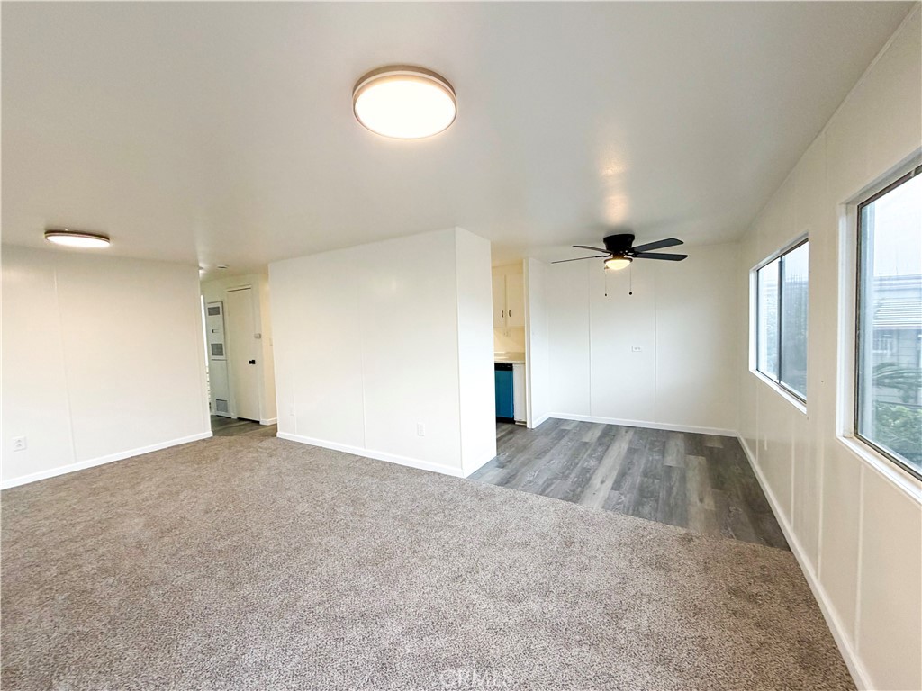 104 Sir Tristram Drive, Unit 104 Riverside, CA 92507 - Photo 11 of 26 a view of empty room with a fireplace