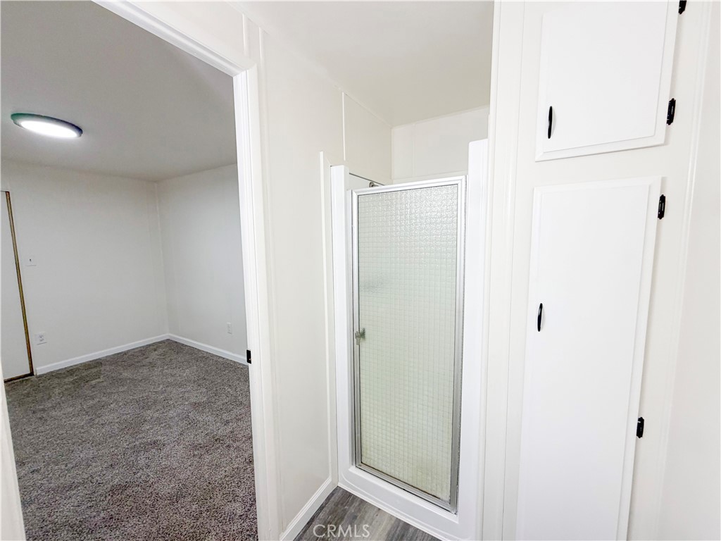 104 Sir Tristram Drive, Unit 104 Riverside, CA 92507 - Photo 17 of 26 Primary Bathroom View to Bedroom