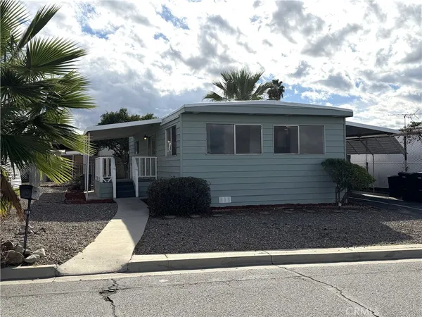 a front view of a house with garage