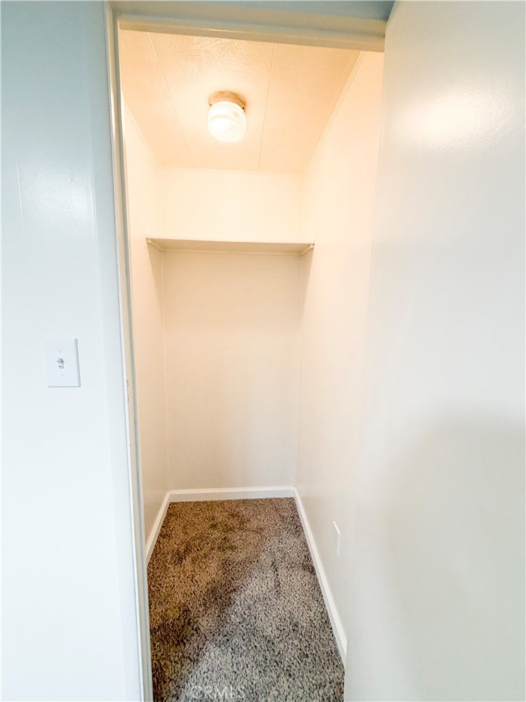 104 Sir Tristram Drive, Unit 104 Riverside, CA 92507 - Photo 21 of 26 Guest Bedroom Closet