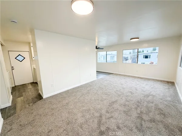 a view of a livingroom with a staircase