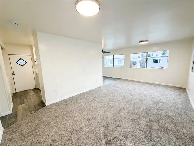 a view of a livingroom with a staircase
